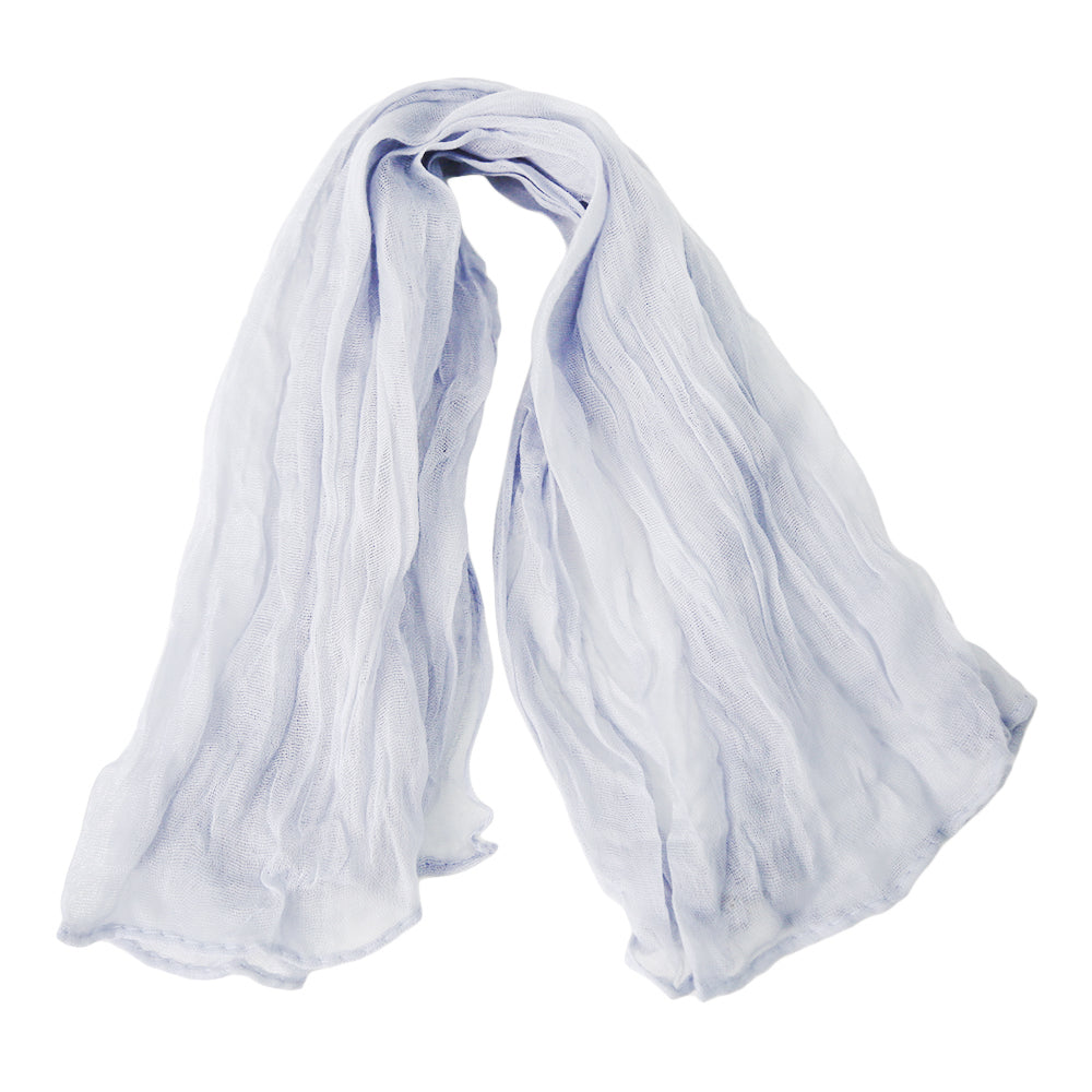 A gauze napkin in off white, made from soft cotton fabric. The subtle off white color adds a gentle and sophisticated touch to table settings, perfect for creating a light and elegant ambiance.