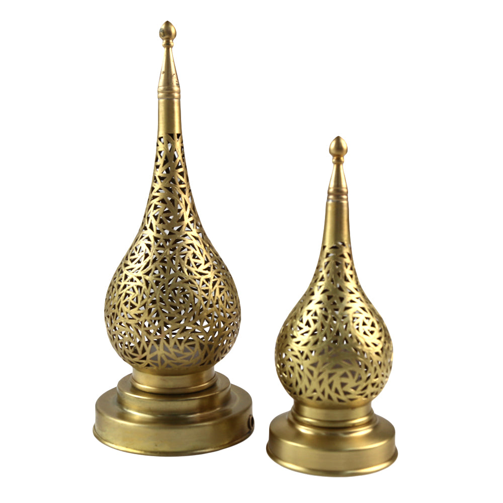 A brass table lamp, featuring a classic and elegant design. The lamp’s polished brass finish adds a touch of sophistication and warmth, making it a stylish addition to desks, bedside tables, or living areas. Ideal for both functional lighting and decorative purposes.