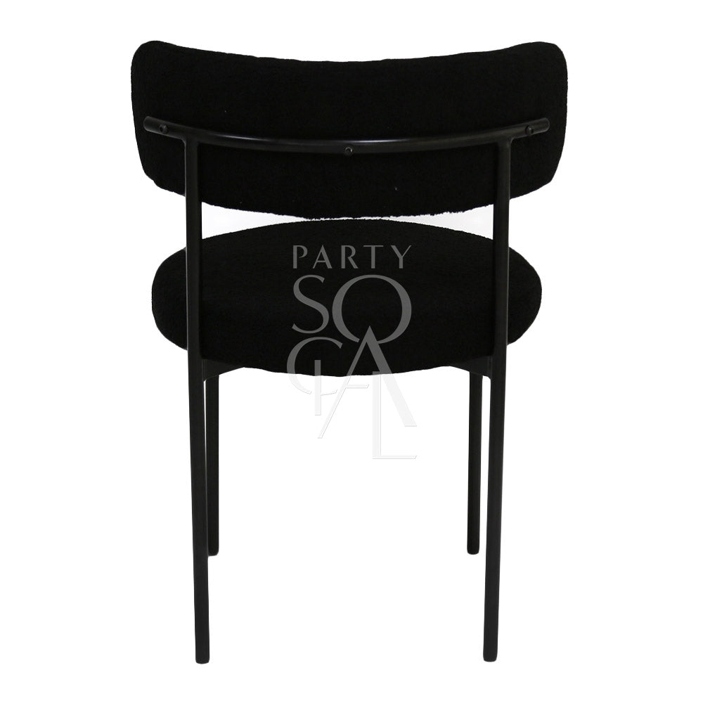 Boucle chairs featuring a textured and stylish design. The chairs are upholstered in boucle fabric, known for its unique, looped texture that adds a touch of elegance and sophistication. Ideal for enhancing the decor of living rooms, lounges, and dining areas with a comfortable and chic seating option.
