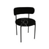 Boucle chairs featuring a textured and stylish design. The chairs are upholstered in boucle fabric, known for its unique, looped texture that adds a touch of elegance and sophistication. Ideal for enhancing the decor of living rooms, lounges, and dining areas with a comfortable and chic seating option.