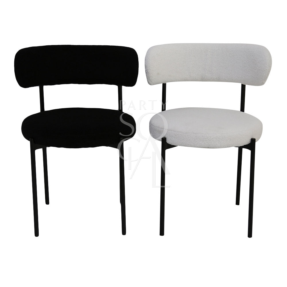 Boucle chairs featuring a textured and stylish design. The chairs are upholstered in boucle fabric, known for its unique, looped texture that adds a touch of elegance and sophistication. Ideal for enhancing the decor of living rooms, lounges, and dining areas with a comfortable and chic seating option.