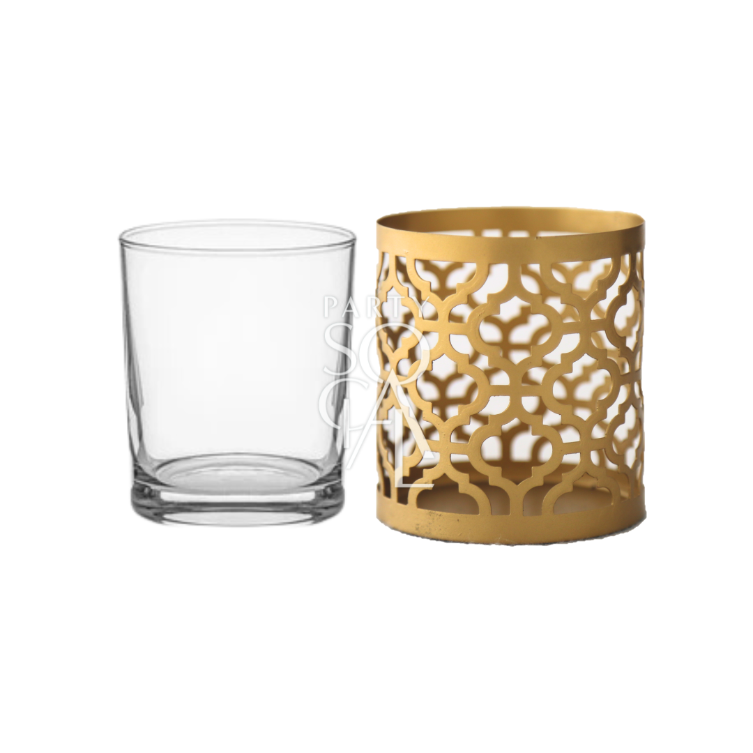 A gold Arabesque candle holder featuring an intricate and elegant design. This candle holder is adorned with detailed Arabesque patterns in a luxurious gold finish, adding a touch of sophistication and charm to any room. Ideal for creating a warm and inviting atmosphere during special occasions or enhancing everyday decor.