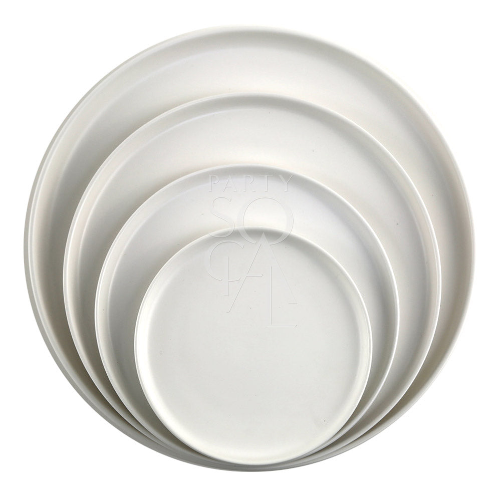 Ceramic plates in white, featuring a classic and elegant design. The smooth, glazed ceramic finish offers a clean and sophisticated look, making these plates ideal for formal dining, casual meals, and adding a timeless touch to any table setting.