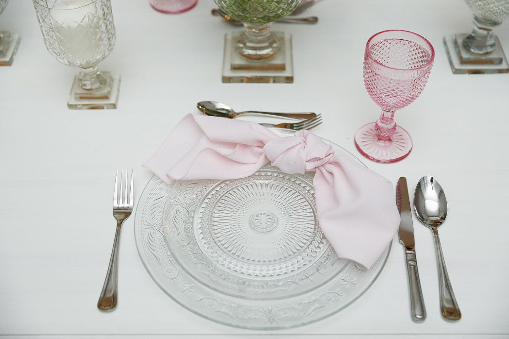Vintage clear glass plates featuring an elegant and timeless design. These plates have a classic transparent glass surface with intricate vintage patterns, adding a touch of nostalgia and sophistication to any table setting. Ideal for formal dinners, special occasions, or adding a refined detail to everyday meals.