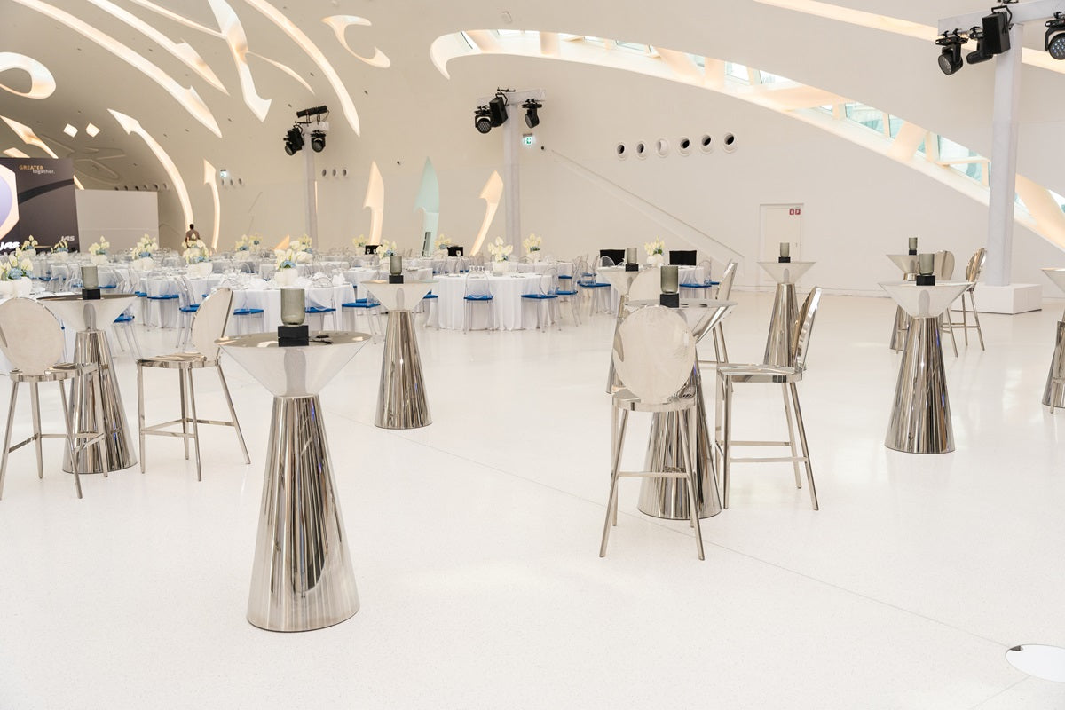 Gold mirror cocktail tables, featuring a luxurious design with reflective gold surfaces. These elegant tables add a touch of sophistication and glamour to any space, making them perfect for enhancing living rooms, lounges, or event areas with a stylish and functional centerpiece.