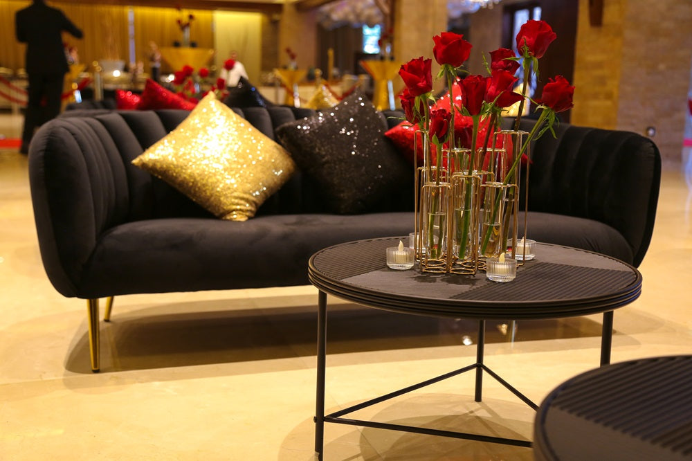 A black lined coffee table featuring a sleek and minimalist design. This modern table has a striking black surface with clean, lined detailing, adding a sophisticated touch to any living room or lounge. Ideal for enhancing your space with contemporary elegance while providing a functional surface for drinks, books, and decorative items.