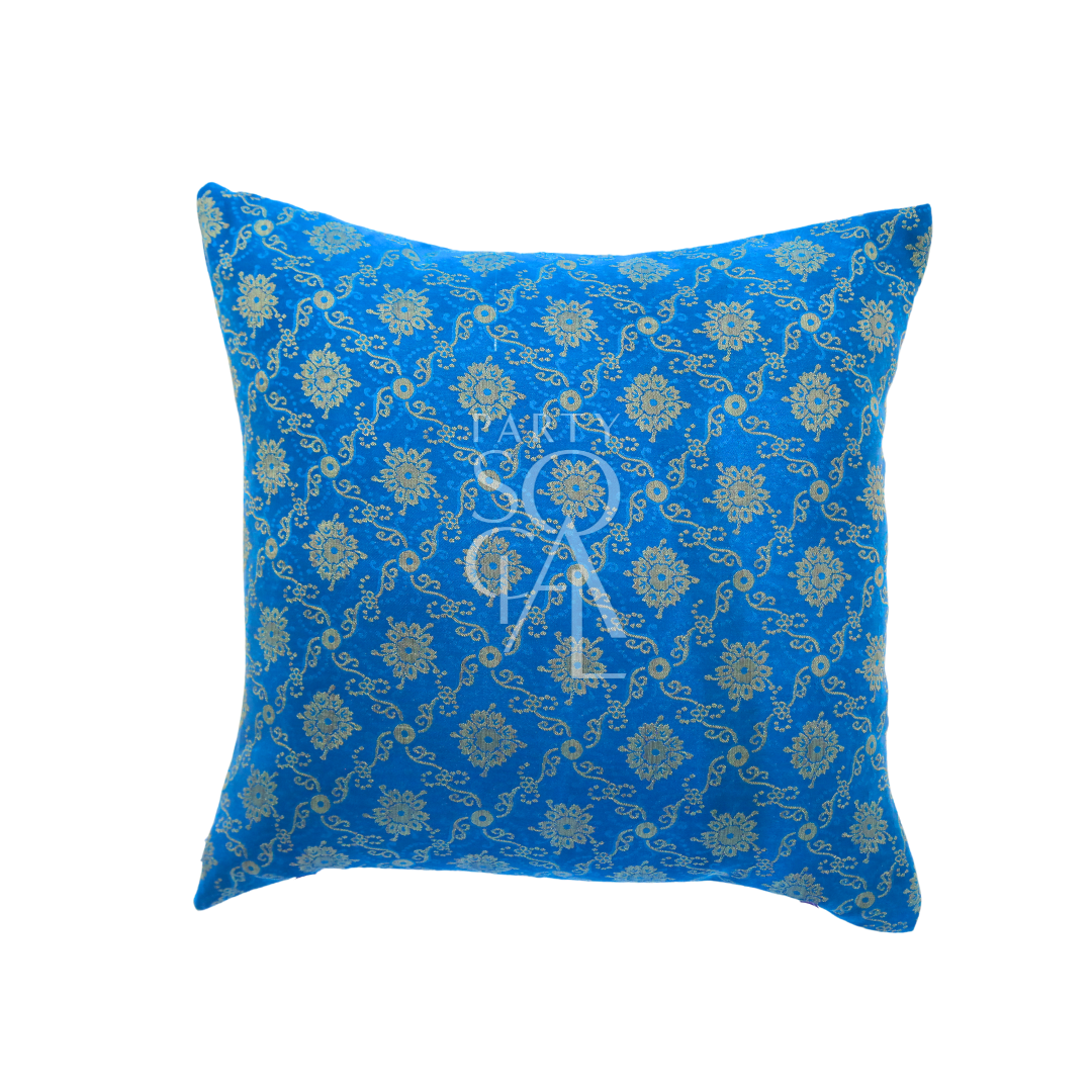 A cushion cover in brocade, featuring a luxurious and intricate pattern with rich textures and details. The brocade fabric adds an elegant and opulent touch, perfect for enhancing the decor of sofas, chairs, or beds with a sophisticated and stylish accent.