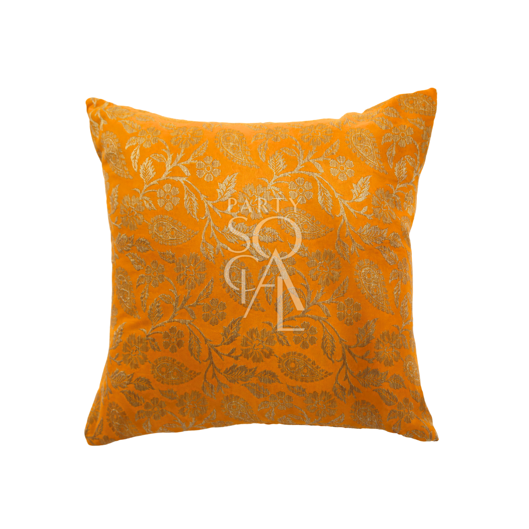 A cushion cover in brocade, featuring a luxurious and intricate pattern with rich textures and details. The brocade fabric adds an elegant and opulent touch, perfect for enhancing the decor of sofas, chairs, or beds with a sophisticated and stylish accent.
