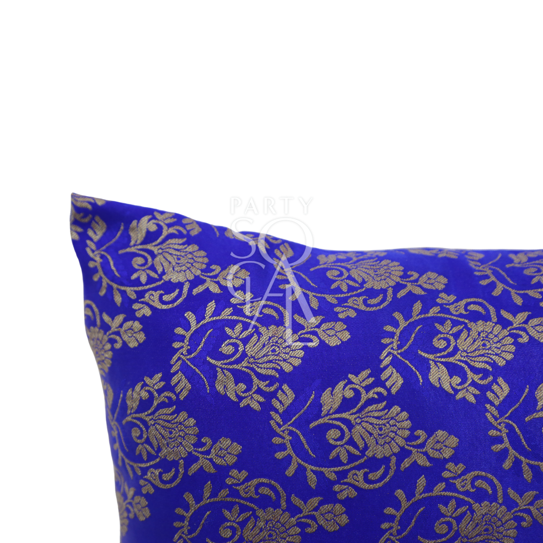 A cushion cover in brocade, featuring a luxurious and intricate pattern with rich textures and details. The brocade fabric adds an elegant and opulent touch, perfect for enhancing the decor of sofas, chairs, or beds with a sophisticated and stylish accent.