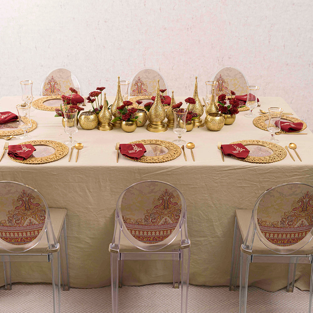 The Vintage Arabesque Collection, featuring a range of elegant and intricately designed items inspired by classic Arabesque patterns. This collection includes decor, tableware, and accessories with vintage flair, characterized by detailed and ornate designs in rich colors, perfect for adding a touch of timeless sophistication to any event or space.