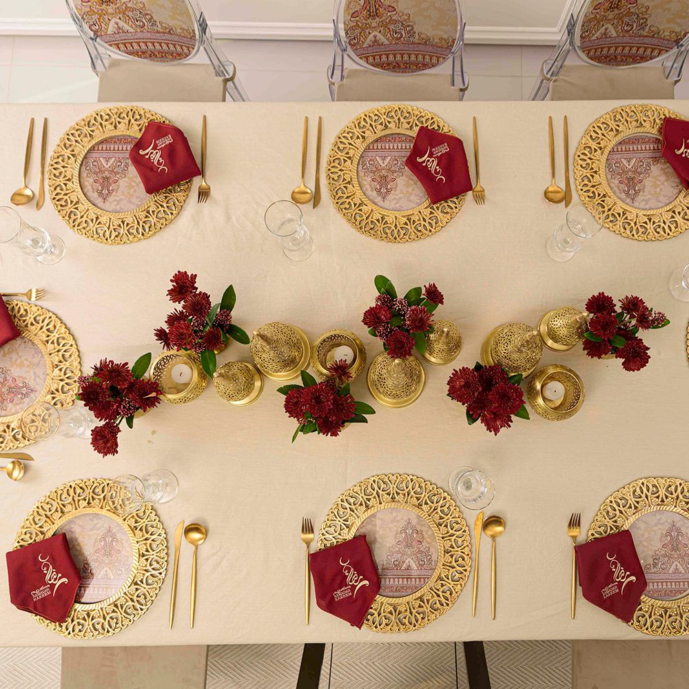 The Vintage Arabesque Collection, featuring a range of elegant and intricately designed items inspired by classic Arabesque patterns. This collection includes decor, tableware, and accessories with vintage flair, characterized by detailed and ornate designs in rich colors, perfect for adding a touch of timeless sophistication to any event or space.