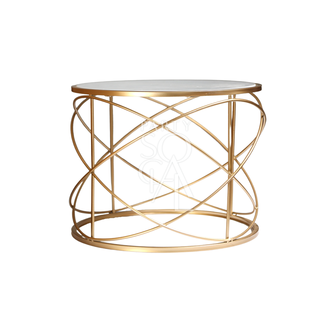 A gold wire coffee table with a marble top featuring a chic and modern design. This stylish table boasts a luxurious marble surface paired with an elegant gold wireframe, creating a striking centerpiece for any living room or lounge. Perfect for adding a touch of sophistication and contemporary flair to your space while providing a functional surface for drinks, decor, and more.