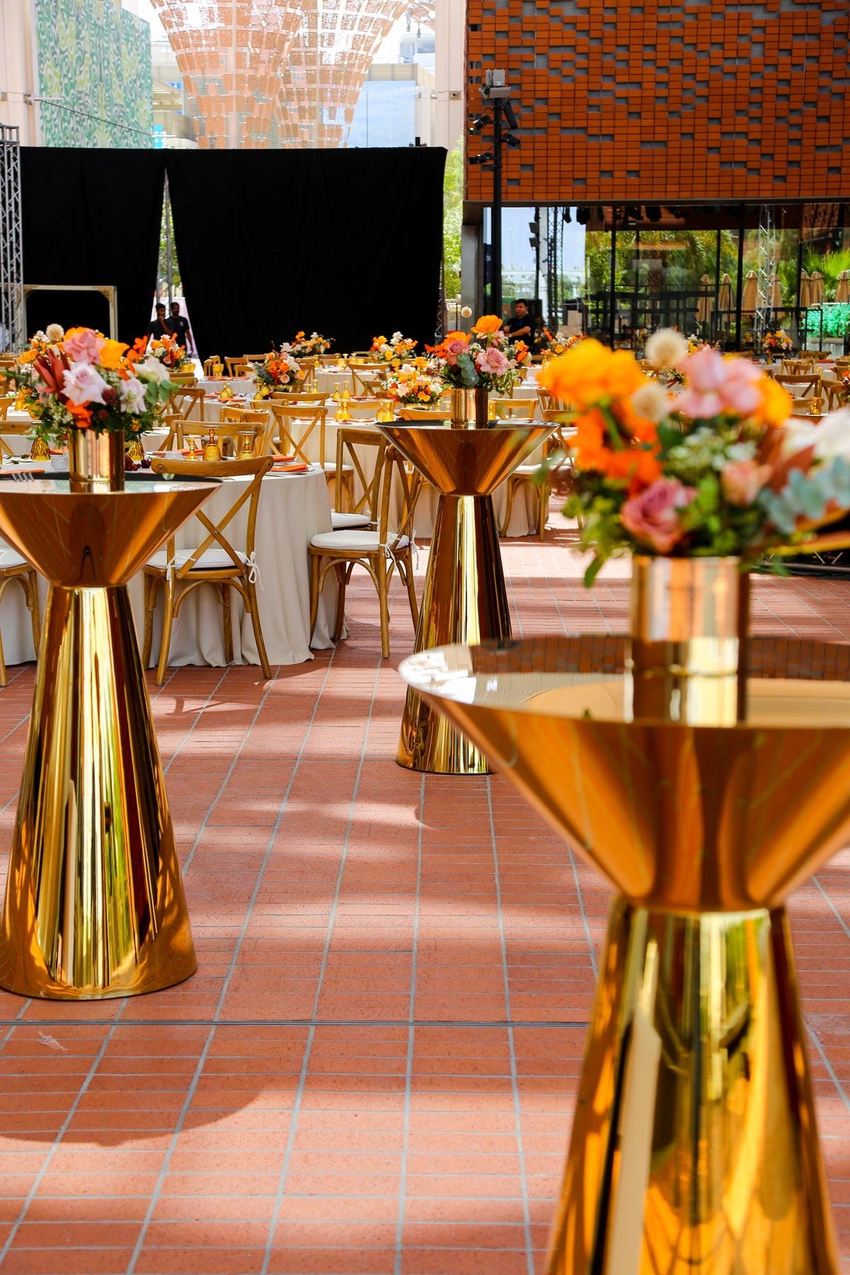 Gold mirror cocktail tables, featuring a luxurious design with reflective gold surfaces. These elegant tables add a touch of sophistication and glamour to any space, making them perfect for enhancing living rooms, lounges, or event areas with a stylish and functional centerpiece.