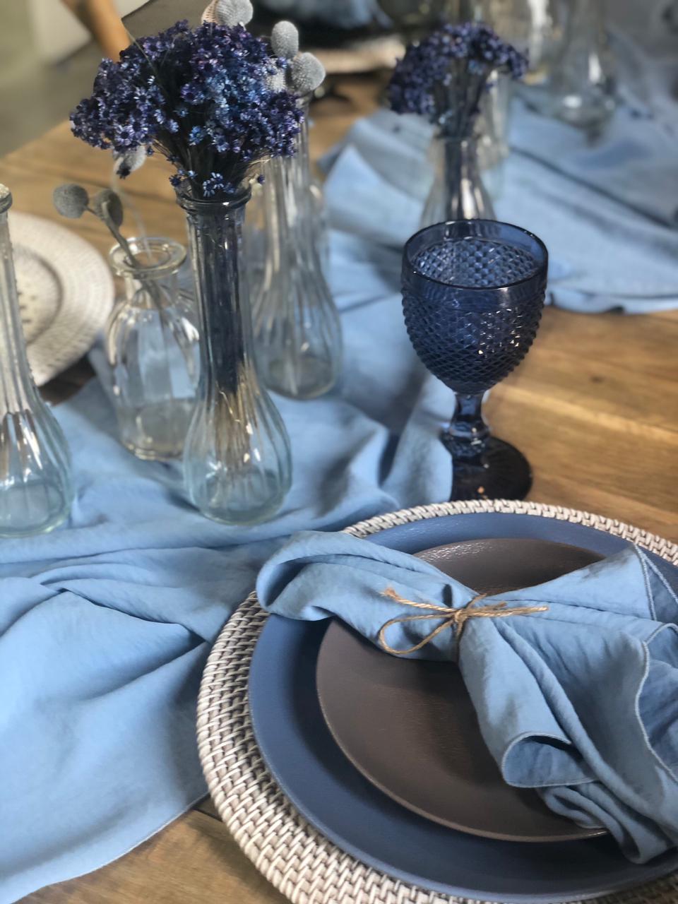A set of mini clear vases featuring a simple and elegant design. These small, transparent vases are perfect for showcasing delicate flowers or small floral arrangements. Ideal for adding a touch of freshness and style to any table, shelf, or countertop, these vases complement various decor styles with their minimalist charm.