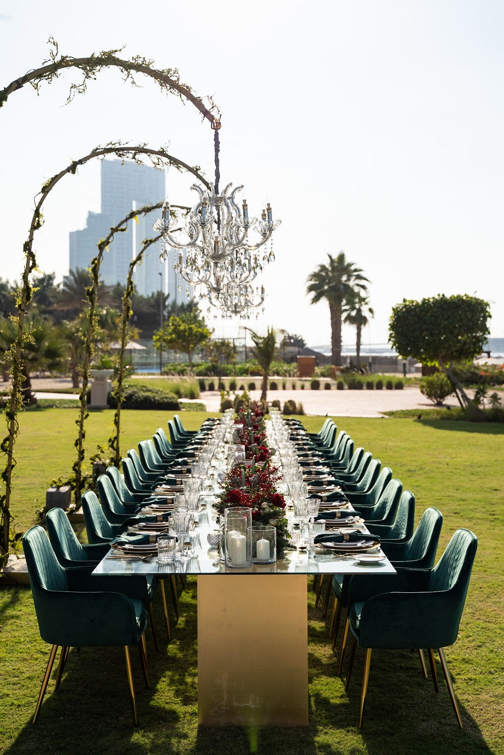 Modern glass dining table featuring a sleek, transparent tabletop supported by a sturdy, minimalist base. The clear glass surface enhances the table’s elegant design, making it a versatile and stylish choice for contemporary dining spaces and modern interiors.