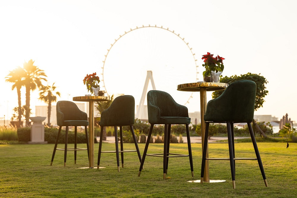 Elegant cocktail tables featuring a luxurious gold finish. These tables offer a sleek and modern design, perfect for adding a touch of glamour to any event or setting. The gold color enhances the table&