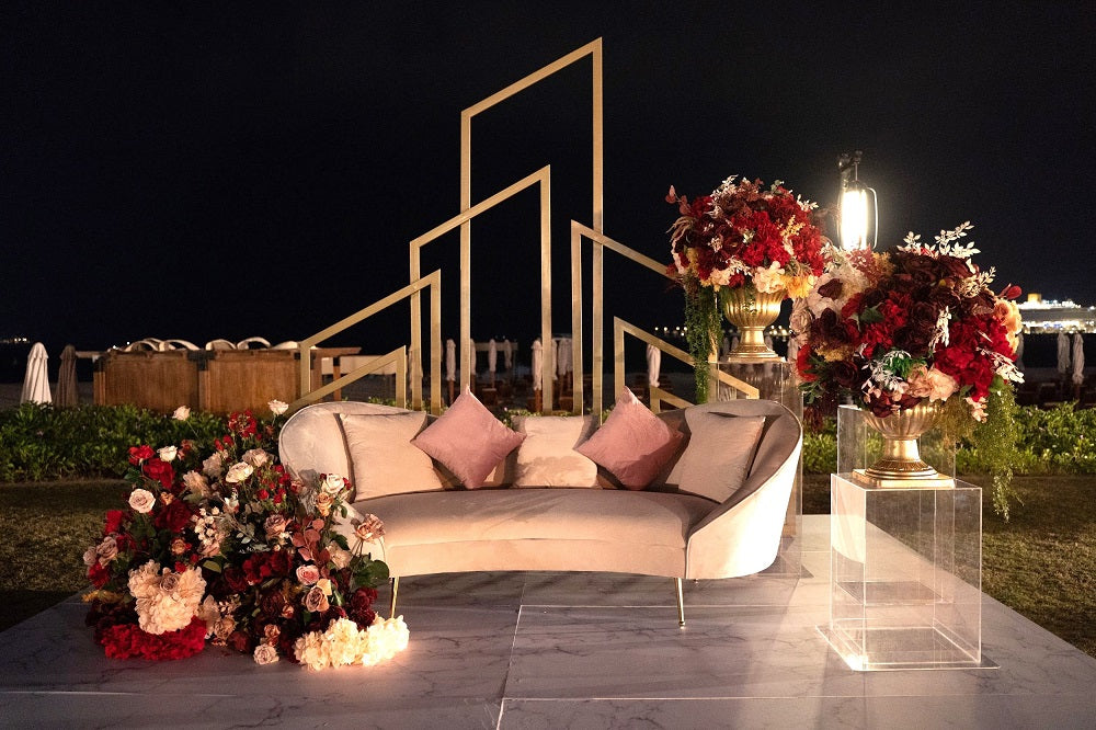 Kosha sand velvet sofa featuring a luxurious and elegant design. This sofa is upholstered in soft sand-colored velvet, providing a plush and sophisticated seating experience. Its sleek lines and rich texture make it a stylish centerpiece for any living room or lounge area, perfect for adding a touch of opulence and comfort to your space.