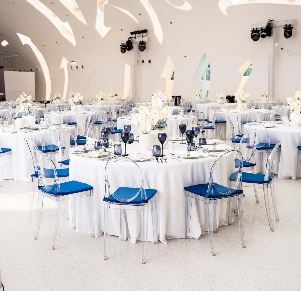 Round banquet tables, providing ample seating and a classic shape for events and gatherings, designed for both comfort and style.
