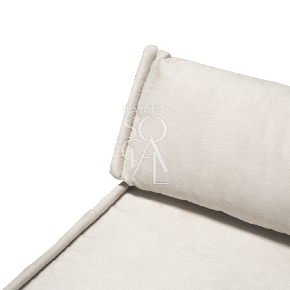 Spacious and modern lounge low seating arrangement featuring plush cushions and a sleek, low-profile design. The seating area includes a combination of modular pieces with soft upholstery in a neutral color palette, ideal for creating a comfortable and stylish relaxation space in contemporary living areas