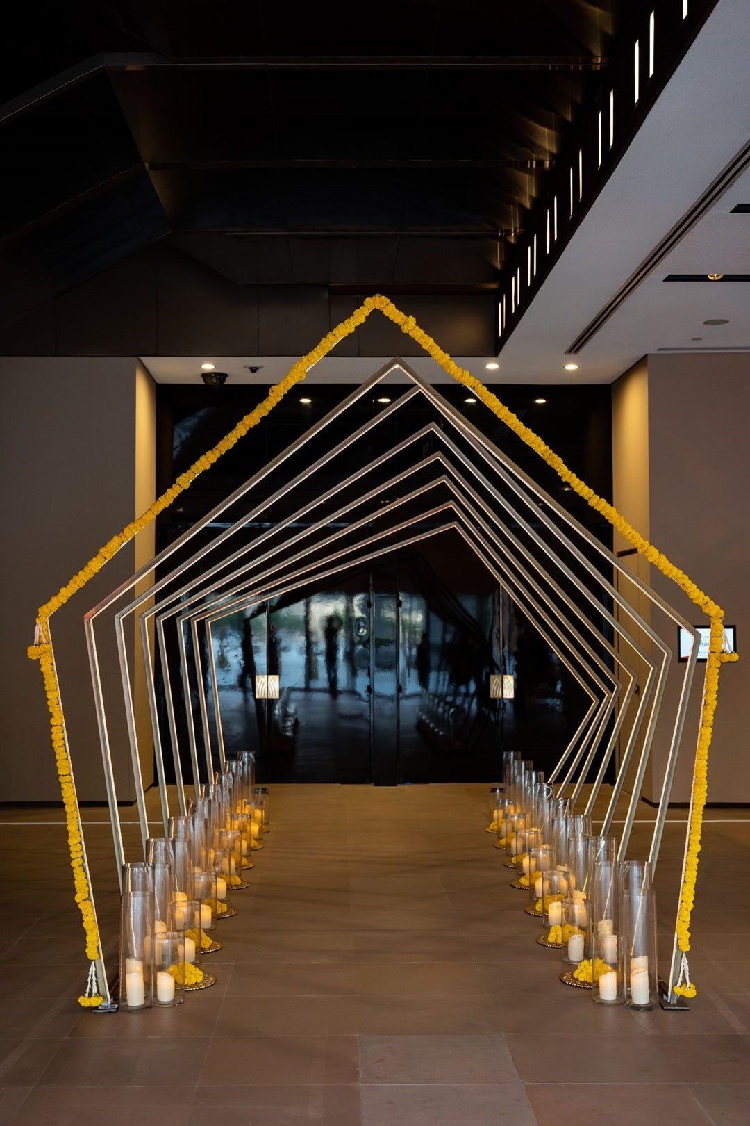 A pentagon tunnel with color-changing LED lights, featuring a unique pentagonal shape and dynamic lighting effects. The tunnel’s LED lights cycle through various colors, creating a vibrant and engaging visual experience. Ideal for adding a futuristic and immersive element to events, parties, or installations.