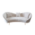 Kosha sand velvet sofa featuring a luxurious and elegant design. This sofa is upholstered in soft sand-colored velvet, providing a plush and sophisticated seating experience. Its sleek lines and rich texture make it a stylish centerpiece for any living room or lounge area, perfect for adding a touch of opulence and comfort to your space.