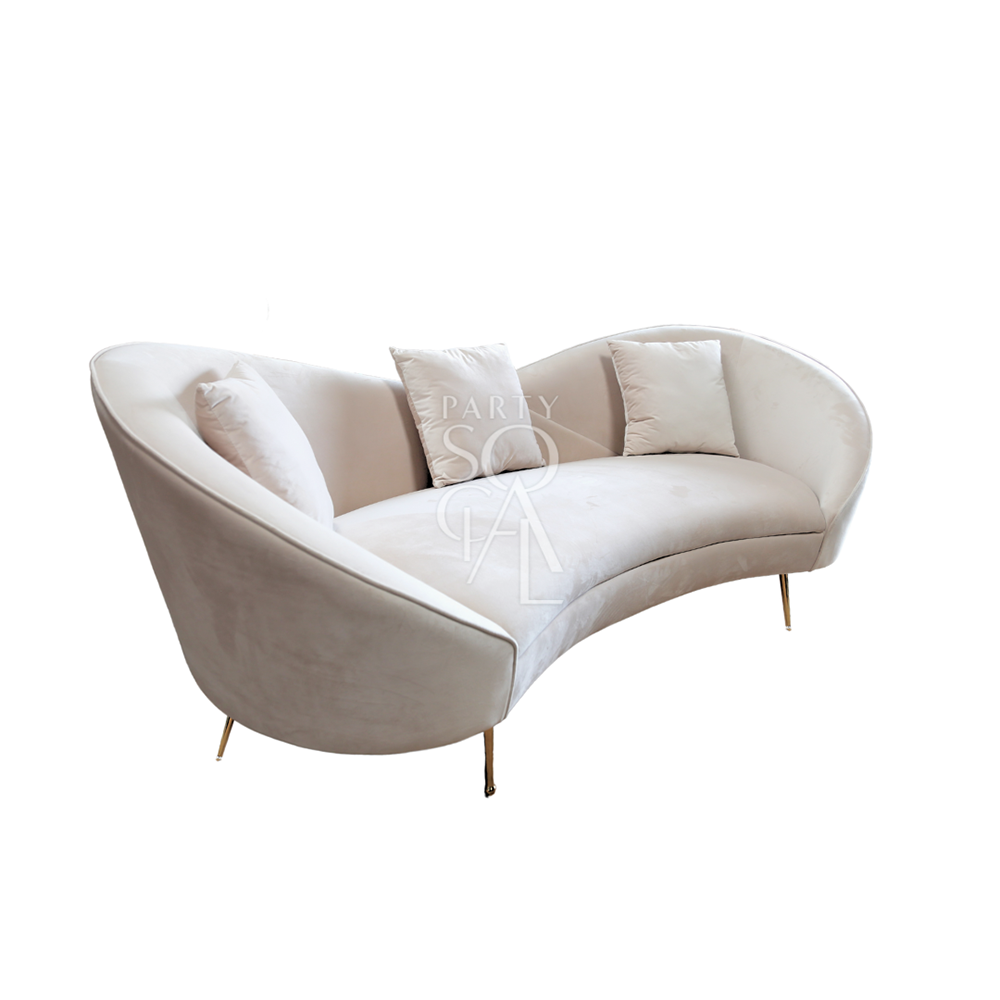 Kosha sand velvet sofa featuring a luxurious and elegant design. This sofa is upholstered in soft sand-colored velvet, providing a plush and sophisticated seating experience. Its sleek lines and rich texture make it a stylish centerpiece for any living room or lounge area, perfect for adding a touch of opulence and comfort to your space.