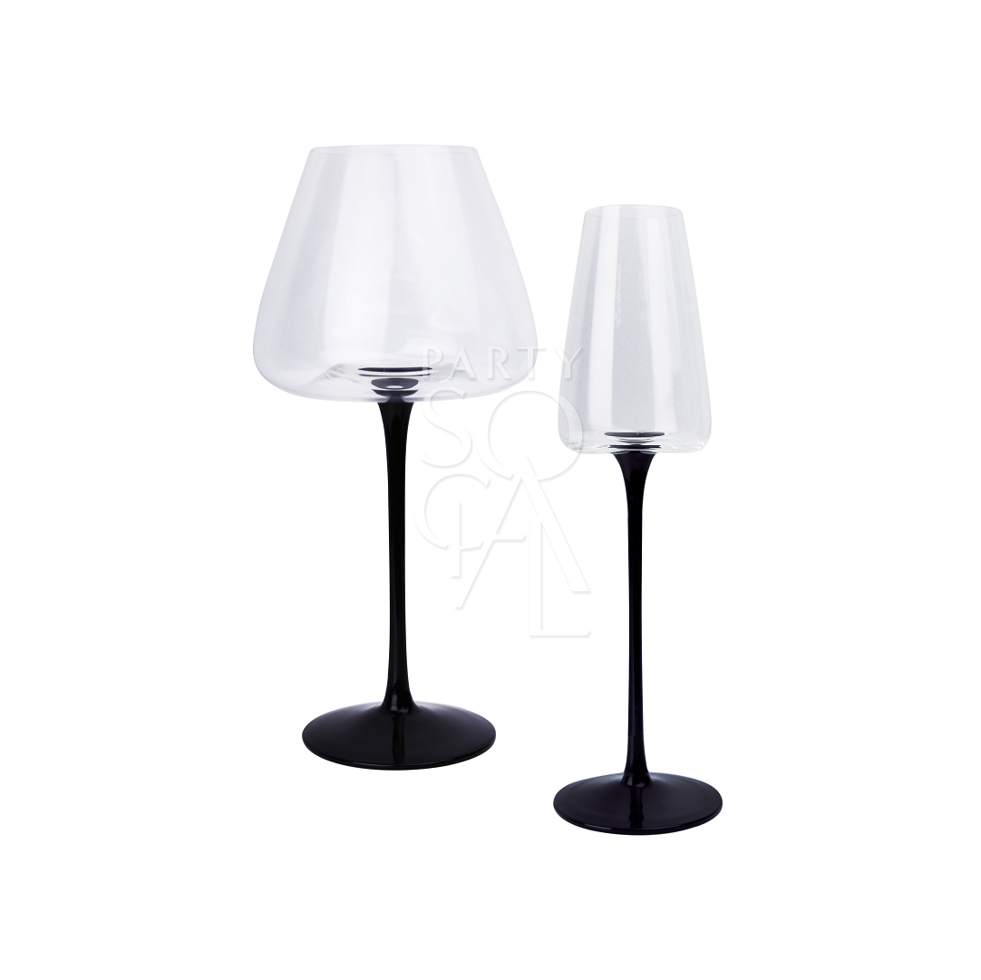 Black stemmed glasses featuring a sleek and modern design. These glasses have a transparent bowl with a striking black stem, adding a contemporary and stylish touch to your table setting. Perfect for enhancing the presentation of drinks at formal dinners, special events, or chic gatherings.