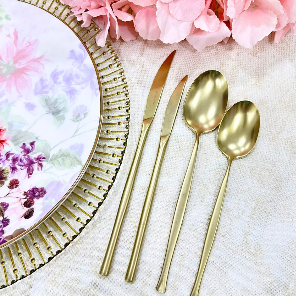 Modern Champagne Cutlery Set, featuring a sleek and contemporary design with a champagne finish. This stylish cutlery set includes dinner knives, dinner forks, dinner spoons, dessert forks, and dessert spoons, perfect for adding a touch of elegance and sophistication to any dining experience. Ideal for formal dinners, special occasions, or everyday use.