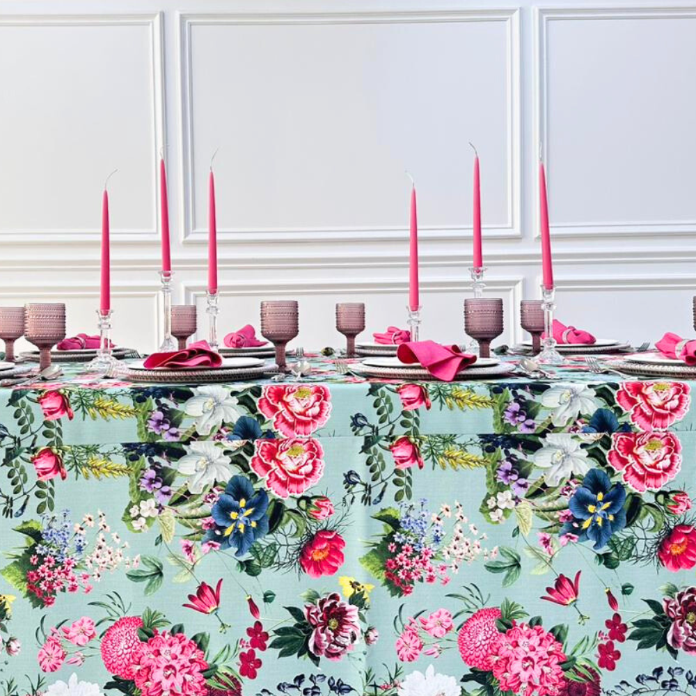A pink peonies rectangular tablecloth featuring a vibrant, floral design. This high-quality tablecloth adds a touch of elegance and charm to your dining table. Made from durable, easy-to-care-for fabric, it is perfect for enhancing any meal or event with a burst of color. Ideal for both everyday use and special occasions, it provides a stylish and sophisticated look to any table setting. Available in various sizes to fit your needs.
