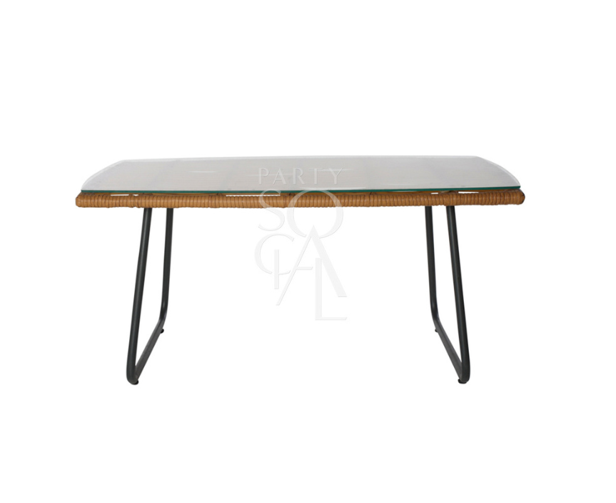 Charming rattan coffee table featuring a natural woven rattan base with a sleek, transparent glass top. The table’s elegant design combines the texture of rattan with the sophistication of glass, making it a stylish and functional centerpiece for living rooms or outdoor spaces.