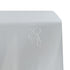 A rectangular satin tablecloth in pristine white, featuring a smooth and lustrous finish. This elegant tablecloth enhances any dining setting with its classic and sophisticated look, perfect for formal events and special occasions.