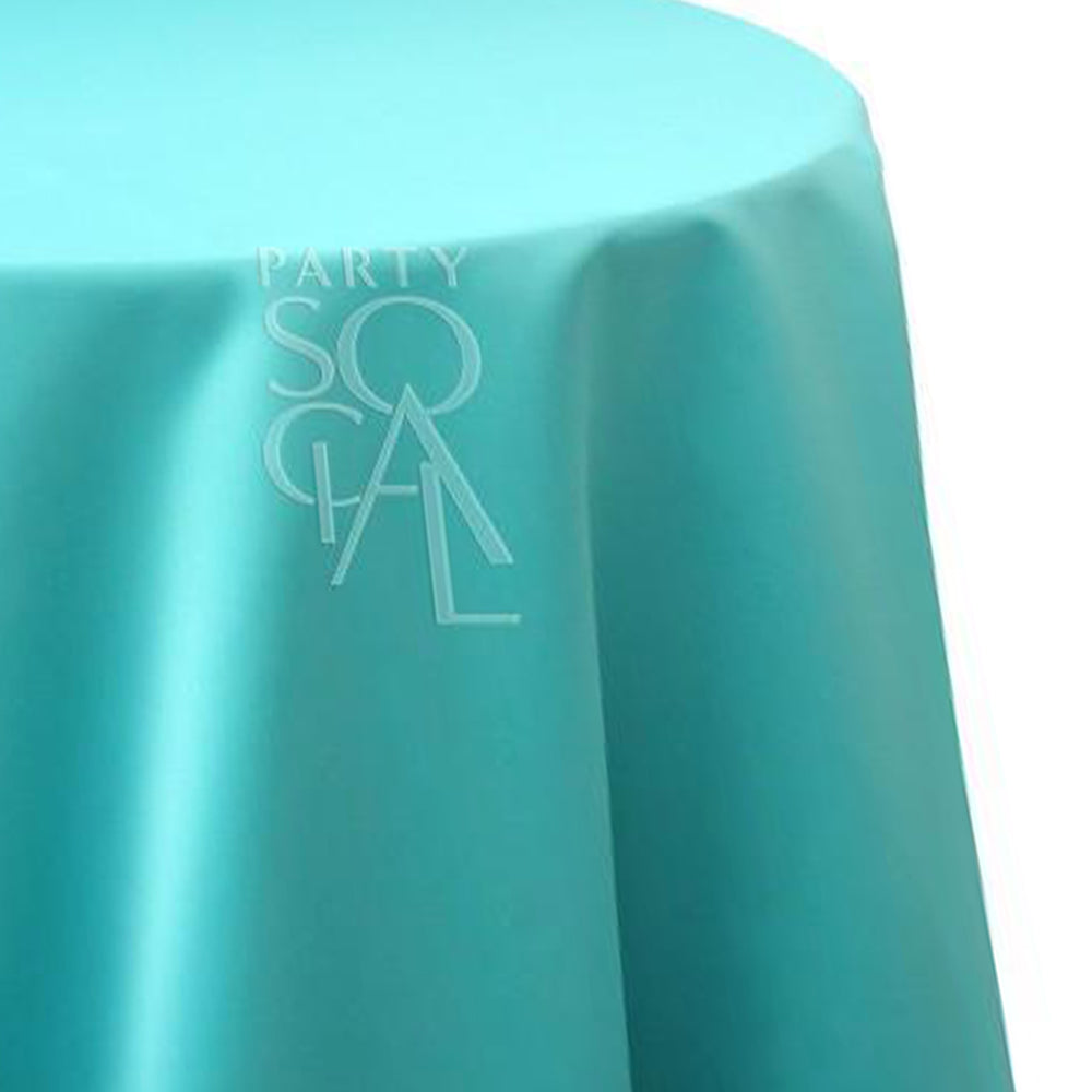 Round satin tablecloth in turquoise, showcasing a vibrant and fresh tone. The turquoise satin adds a lively and elegant touch, ideal for a bold and stylish table setting.