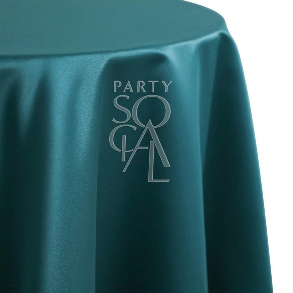 Round satin tablecloth in royal green, featuring a deep and luxurious hue. The royal green satin adds a regal and sophisticated touch, perfect for creating an opulent and elegant ambiance.