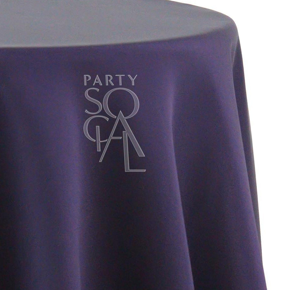 Round satin tablecloth in aubergine, showcasing a rich and deep tone. The aubergine satin adds a luxurious and dramatic touch, perfect for a bold and sophisticated table setting.