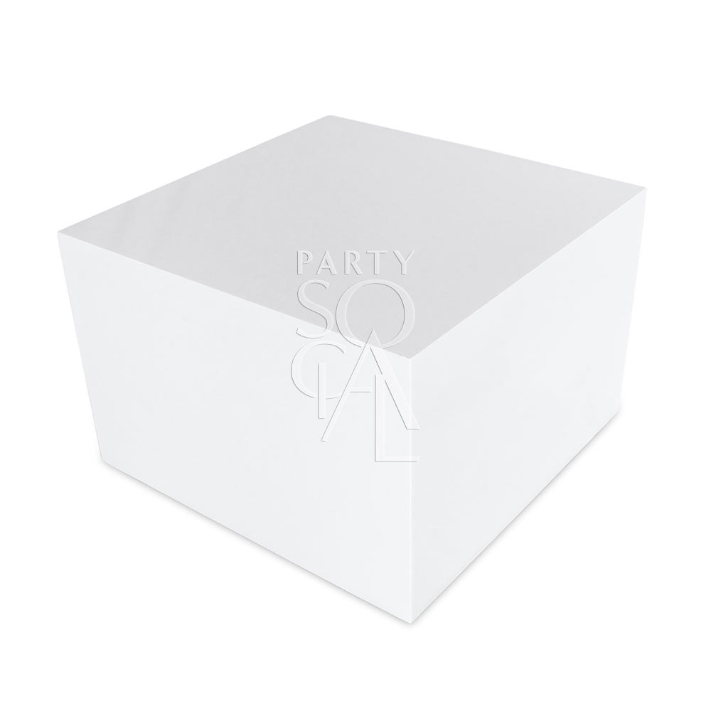 Boxy white coffee table with a clean, modern design and a minimalist rectangular shape. Features a smooth white surface and sturdy legs for a sleek, contemporary look.