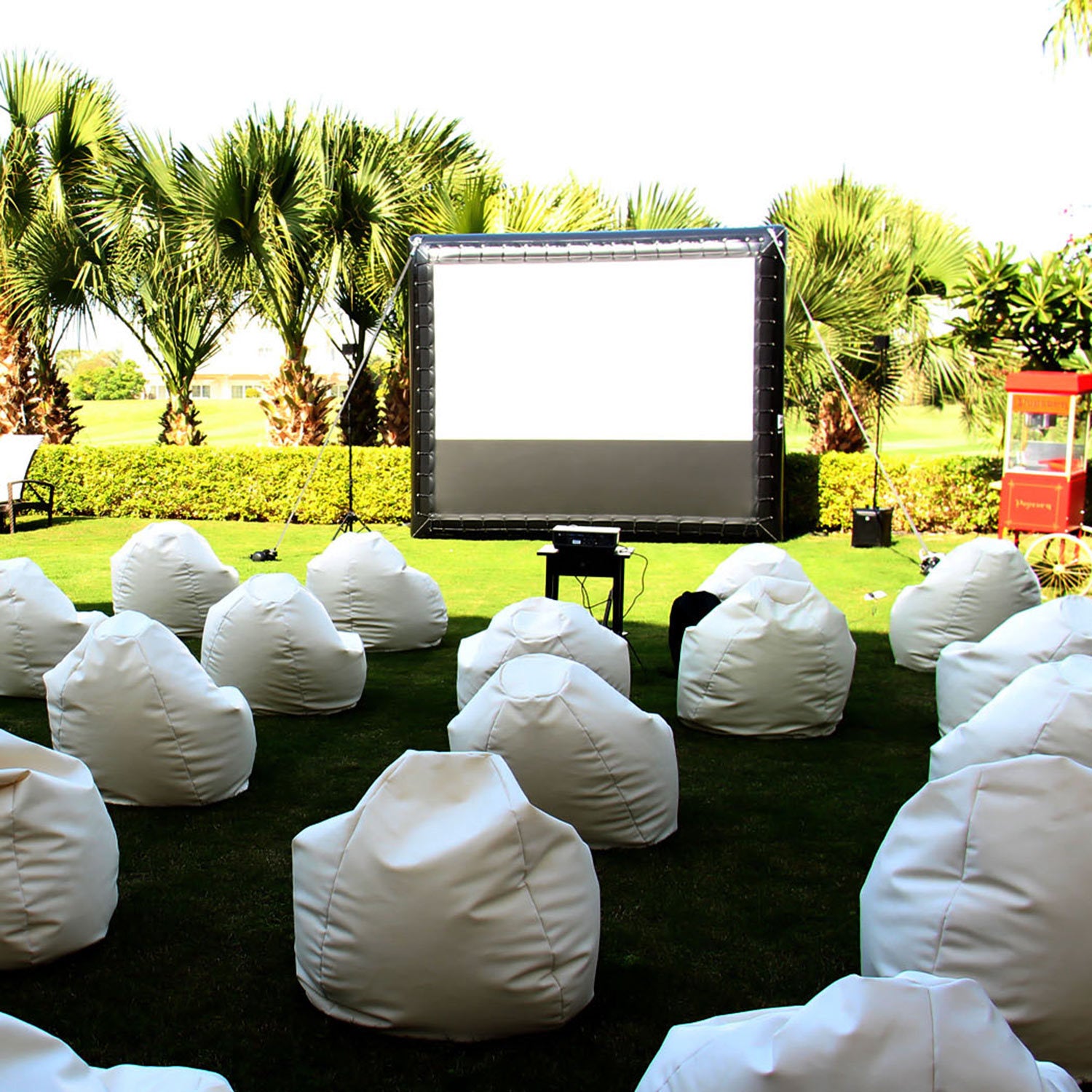 White beanbag chair with a soft, smooth surface and relaxed, casual design, ideal for comfortable seating.