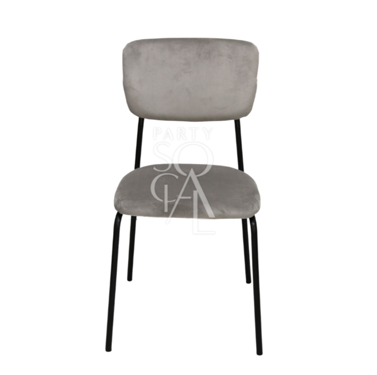 Simple velvet chairs featuring a minimalist design with plush velvet upholstery. These chairs offer a sleek, elegant appearance with their soft fabric and clean lines, making them a versatile choice for enhancing both modern and traditional interiors. Perfect for adding a touch of sophistication and comfort to dining areas, living rooms, or offices.