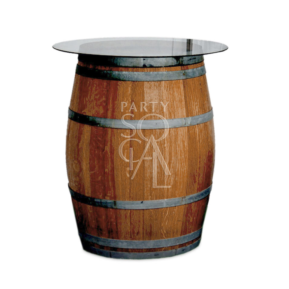 Rustic wine barrel table with a 225-liter capacity. Crafted from a vintage wine barrel with a natural wood finish and metal bands. Ideal for adding a classic, rustic touch to any setting.