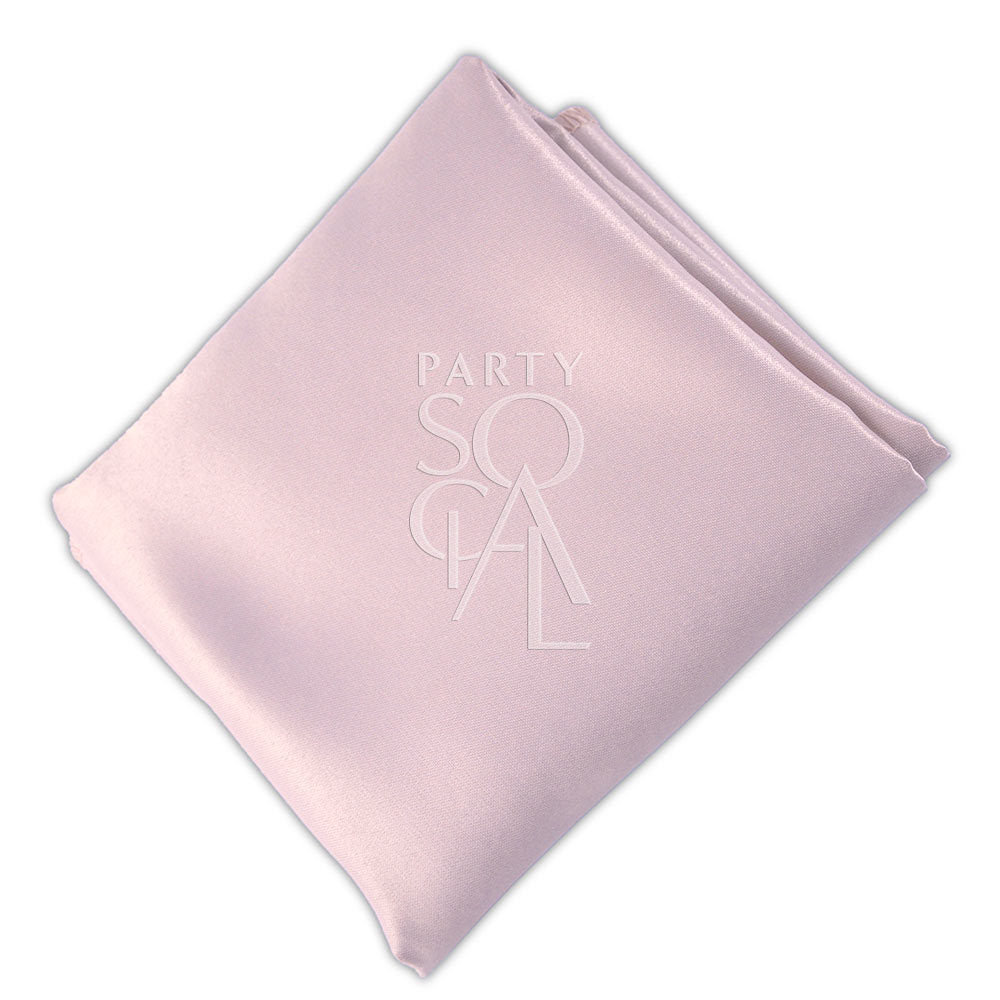 Elegant blush pink satin napkin, featuring a soft and romantic hue with a smooth, luxurious finish. The blush pink adds a delicate and charming touch to any table setting.