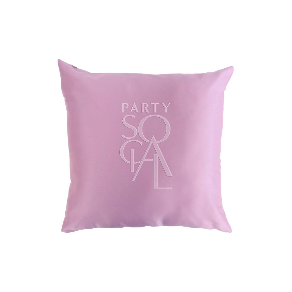 Charming satin cushion cover in a soft pink color, featuring a smooth and shiny texture. The gentle pink hue adds a touch of sweetness and elegance, perfect for brightening up any room or decor.