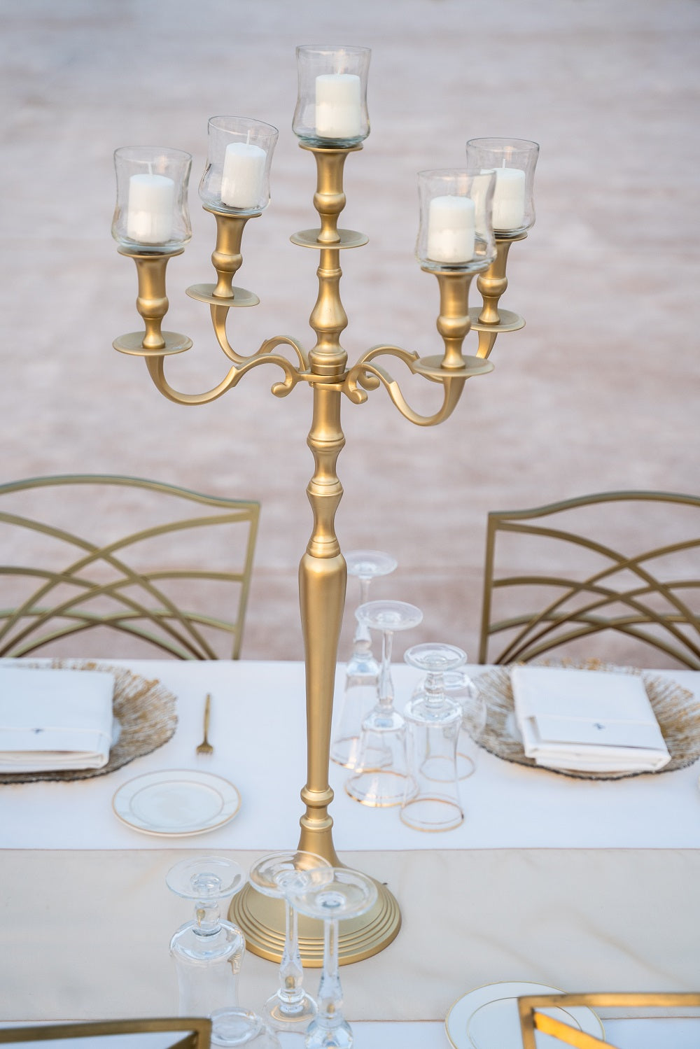 Elegant candelabra with multiple arms for holding candles, designed to add a touch of sophistication and ambient lighting to any setting.