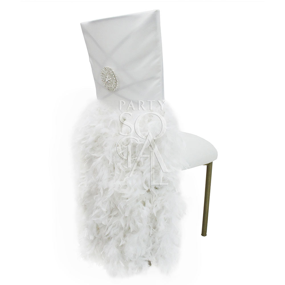 Feathered off-white satin chair cover designed for Chameleon chairs, featuring luxurious satin fabric adorned with soft, cascading feathers. This elegant cover adds a touch of glamour and sophistication to any event, with the feathers providing a unique and eye-catching texture. Perfect for weddings, galas, and high-end celebrations, this chair cover brings a sense of opulence and style to your seating arrangement.