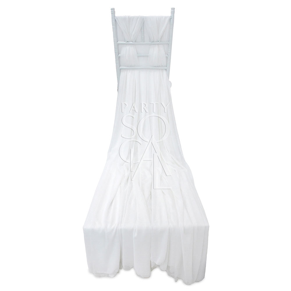 Elegant white chiffon chair cover with a flowing train designed for Chiavari chairs. Features soft, translucent chiffon fabric that adds a classic touch of sophistication.