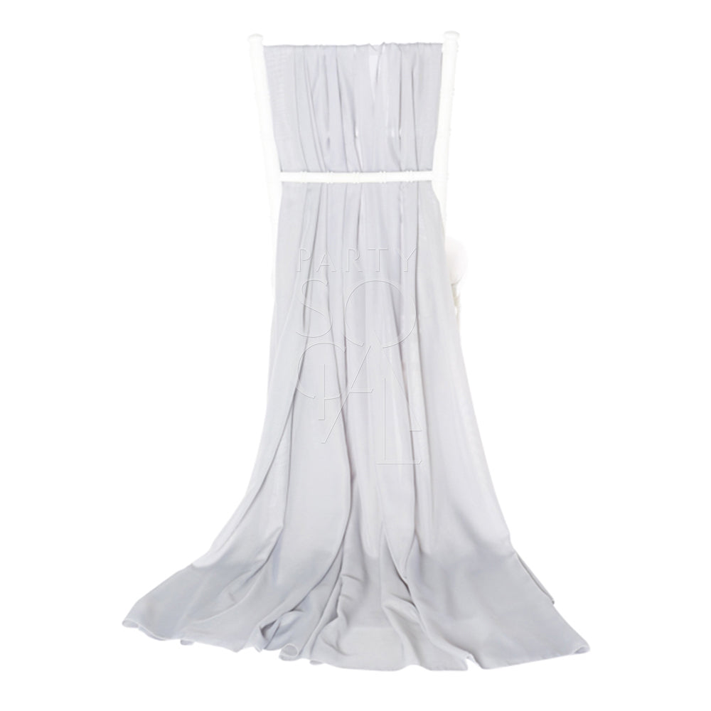 Stylish grey chiffon chair cover with a graceful train for Chiavari chairs. The light grey fabric enhances the chair with a modern, understated elegance.