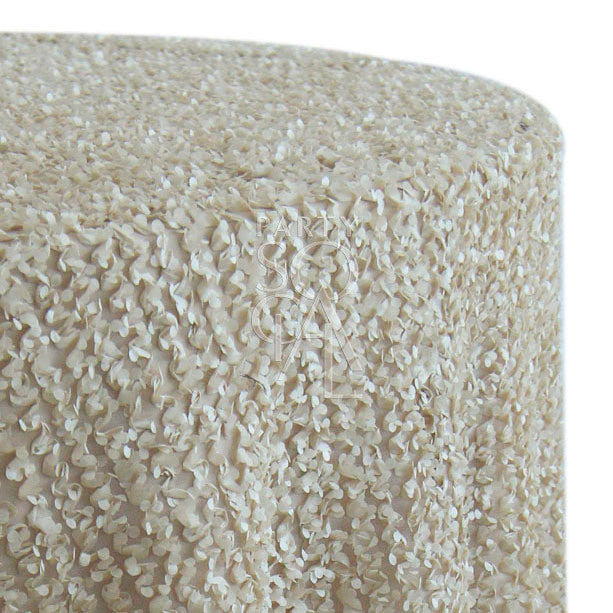 Round tablecloth with a textured fabric, featuring a subtle and elegant pattern that adds depth and interest. The textured design enhances the table setting with a sophisticated and stylish touch, ideal for both casual and formal occasions.