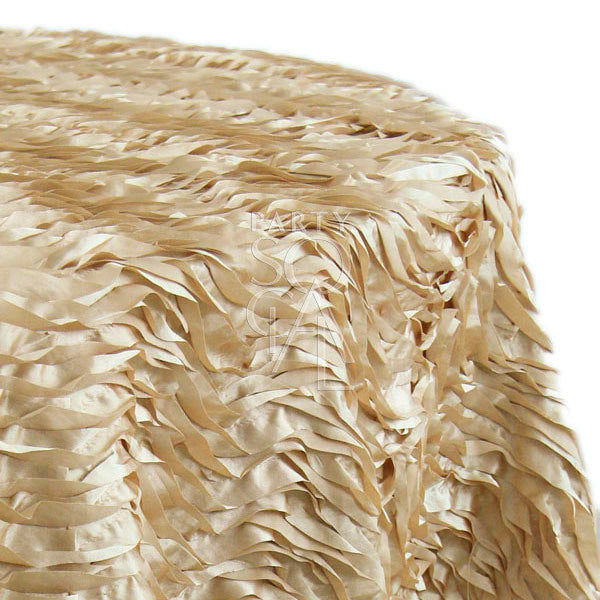 Round tablecloth with a textured fabric, featuring a subtle and elegant pattern that adds depth and interest. The textured design enhances the table setting with a sophisticated and stylish touch, ideal for both casual and formal occasions.