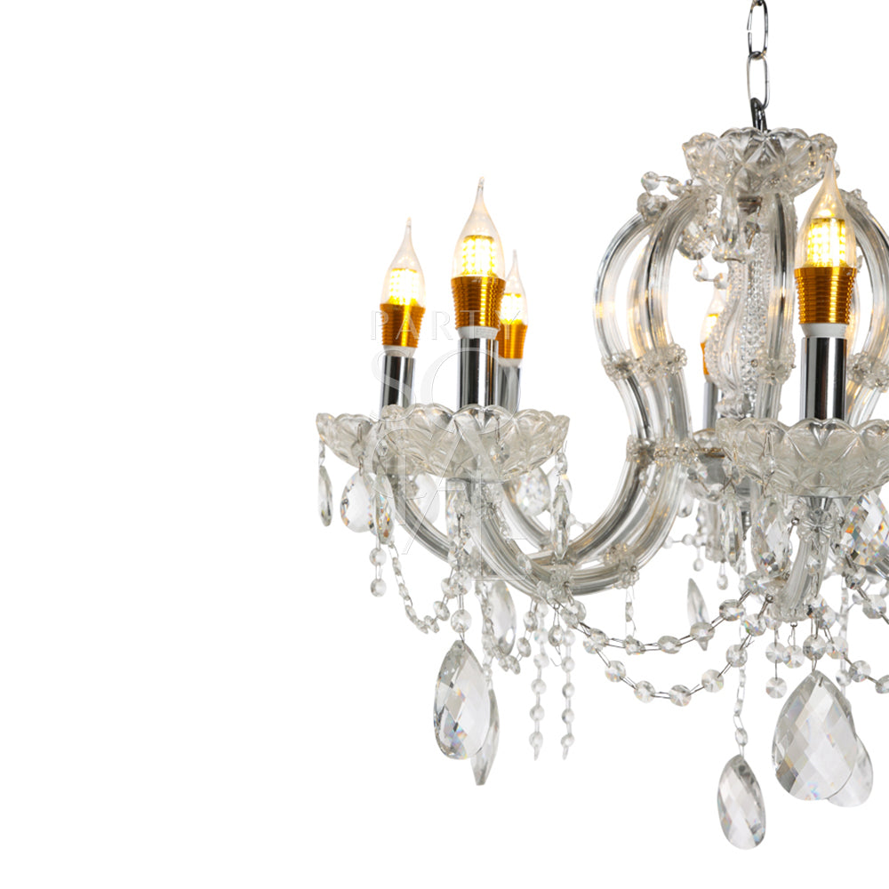 Exquisite crystal chandelier featuring a dazzling array of crystal droplets and intricate metalwork. The chandelier’s sparkling crystals reflect light beautifully, creating a luxurious and elegant ambiance. Ideal for adding a touch of glamour and sophistication to any grand space or formal setting.