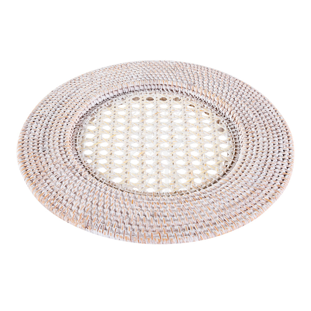 Rattan charger plate in an ivory finish, offering a soft and neutral tone. The ivory rattan provides a light and elegant touch, perfect for creating a serene and chic table setting.
