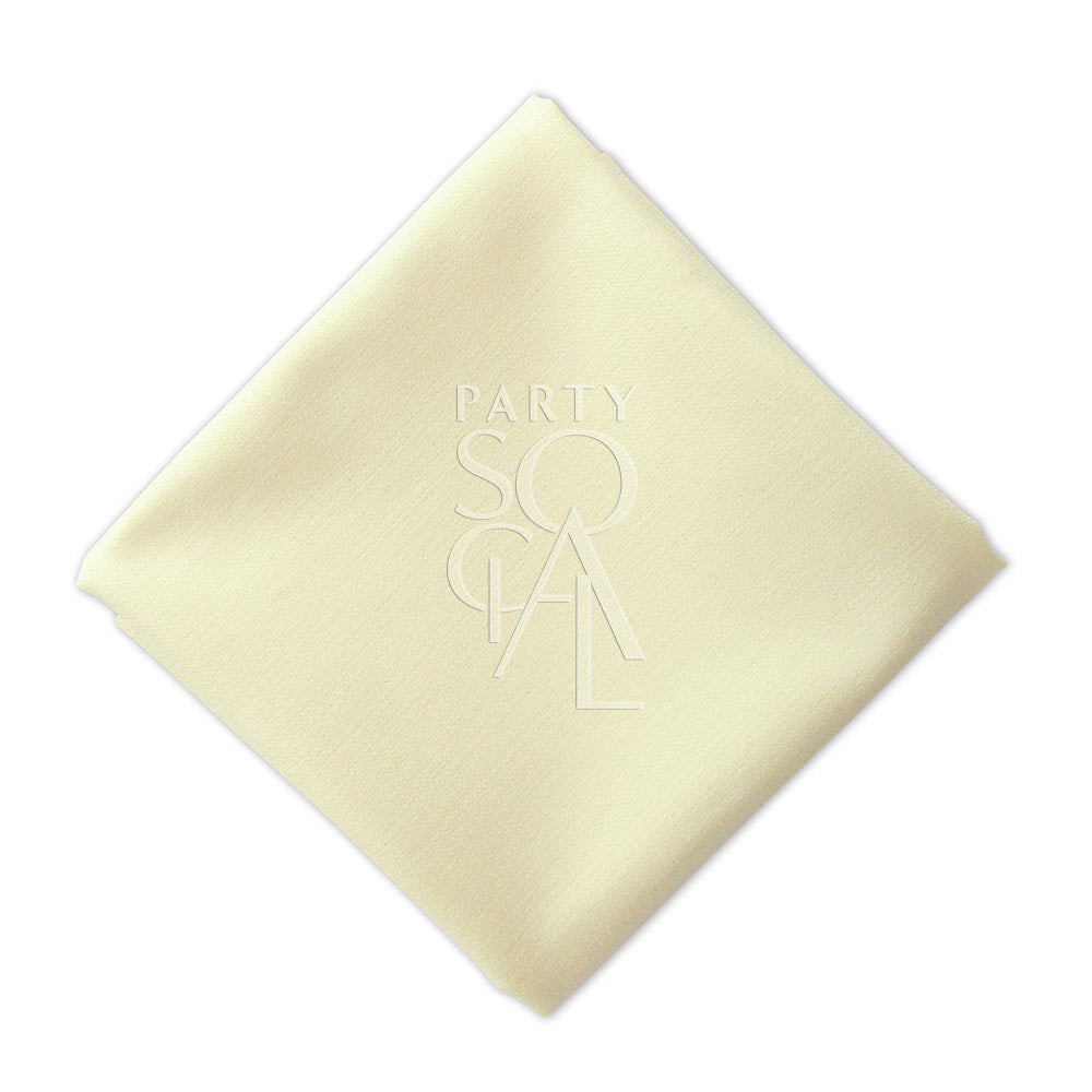 Soft cream linen blend napkin, offering a warm and neutral tone that adds a touch of elegance to any table arrangement.