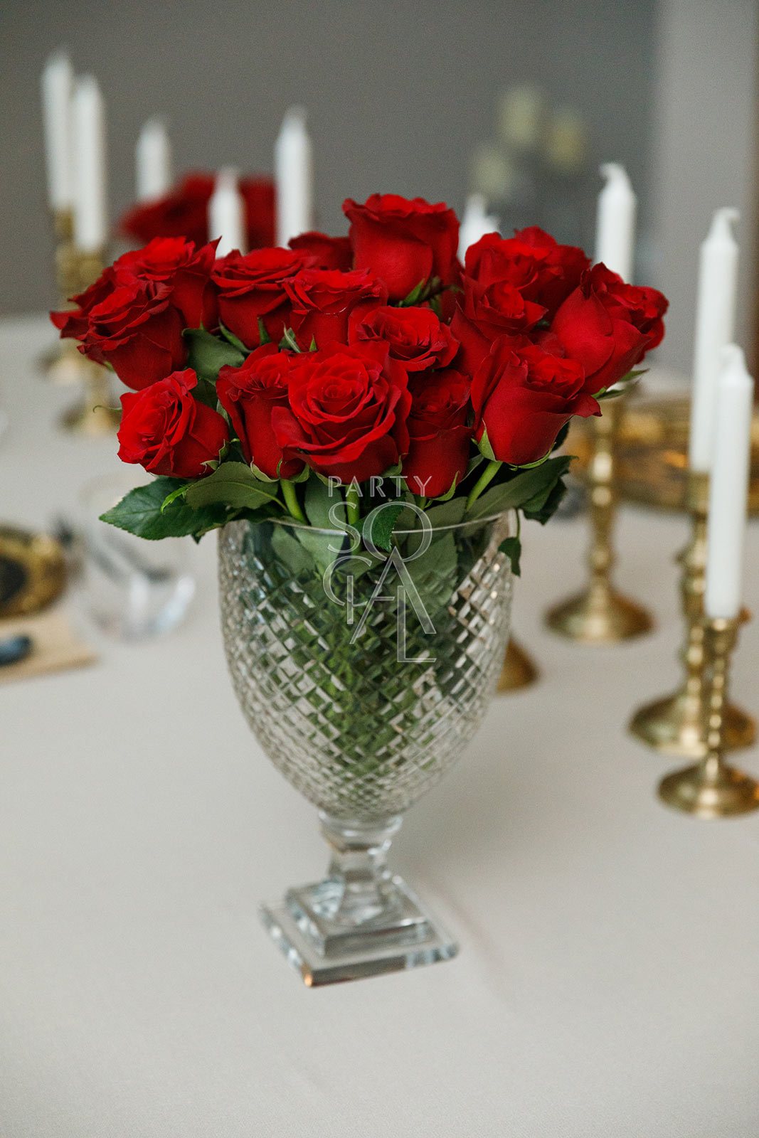 Exquisite crystal cut vases featuring intricate geometric patterns and a dazzling, faceted design. The vases’ clear, sparkling crystal enhances their elegant appearance, making them ideal for showcasing flowers or serving as decorative accents in any sophisticated setting.